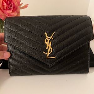 YSL MONOGRAM CLUTCH IN QUILTED GRAIN DE POUDRE EMBOSSED LEATHER
